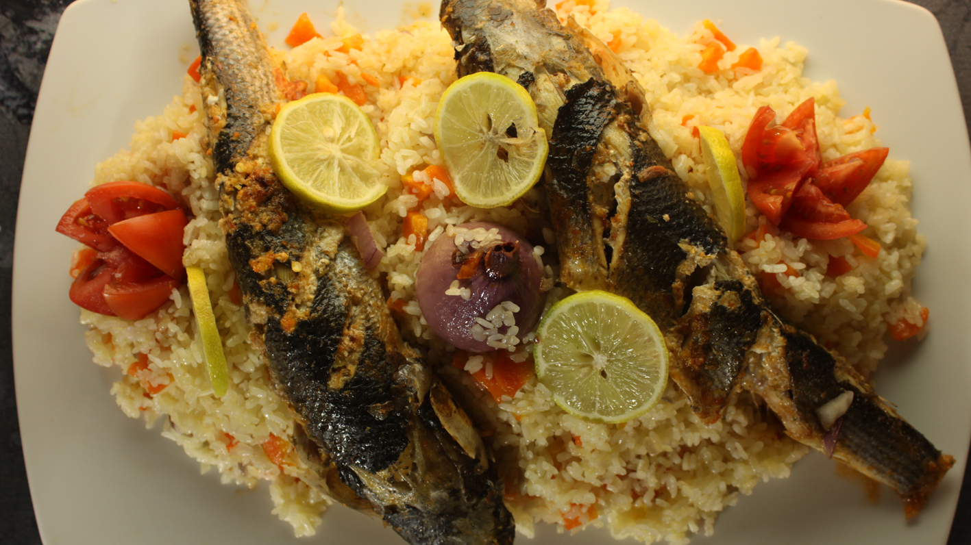 سمك بوري حار مع ارز