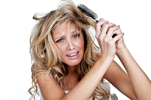 5 أشياء تدمر شعرك