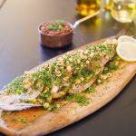 سمك-قاروص-مشوى-مع-صوص-البندق